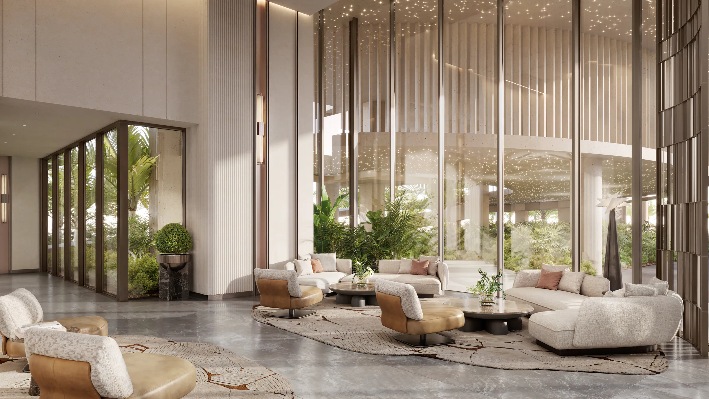 The lobby lounge: soft seating beneath a lit double-height glass wall and planting