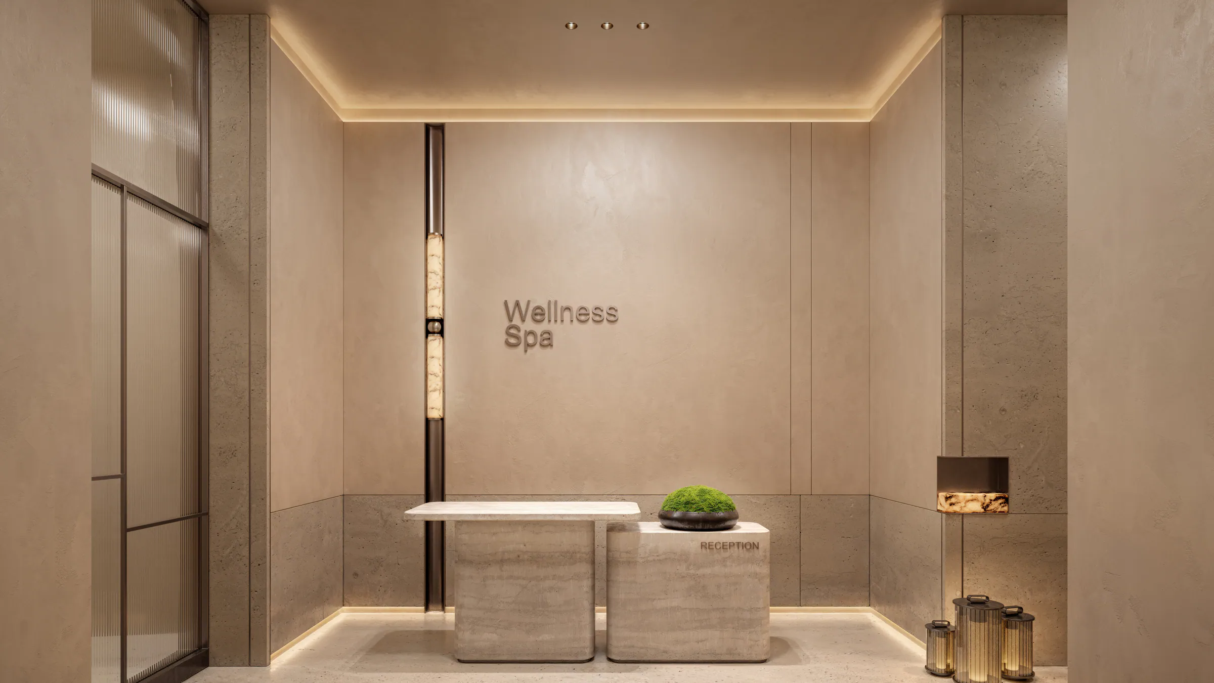 The spa reception: a stone counter, warm light and a planted ledge