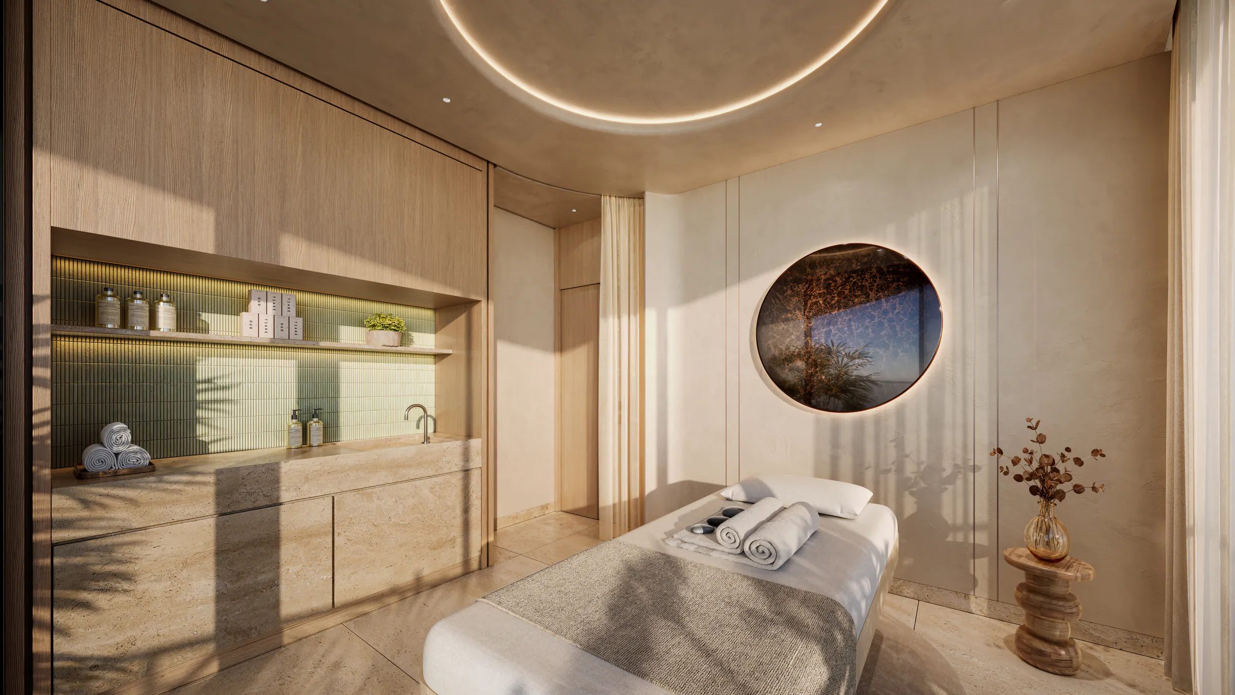 A private treatment room with soft light and a round window