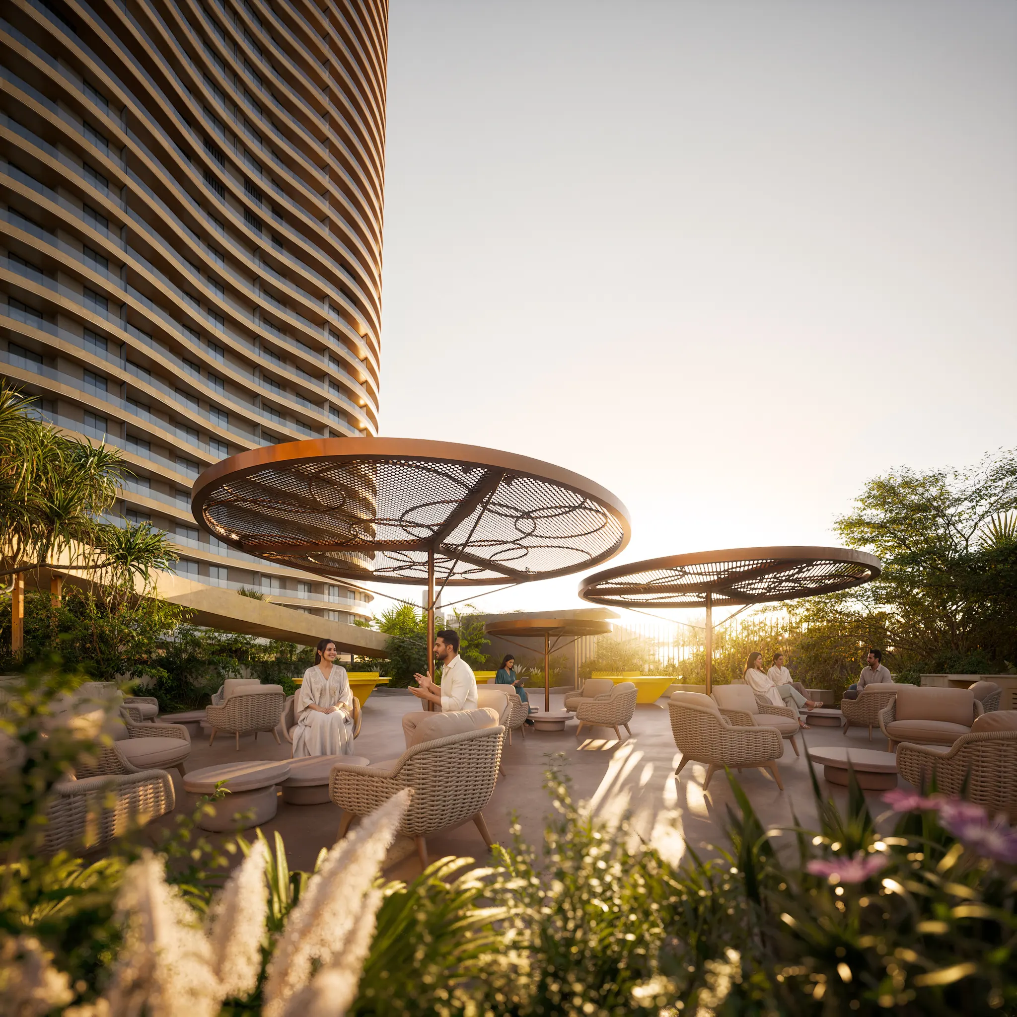 Residents on a shaded garden terrace beside the tower at sunset