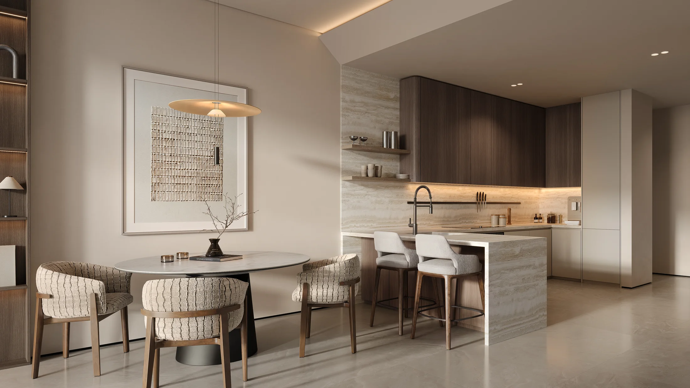 An open kitchen with an island and stools beside the dining table