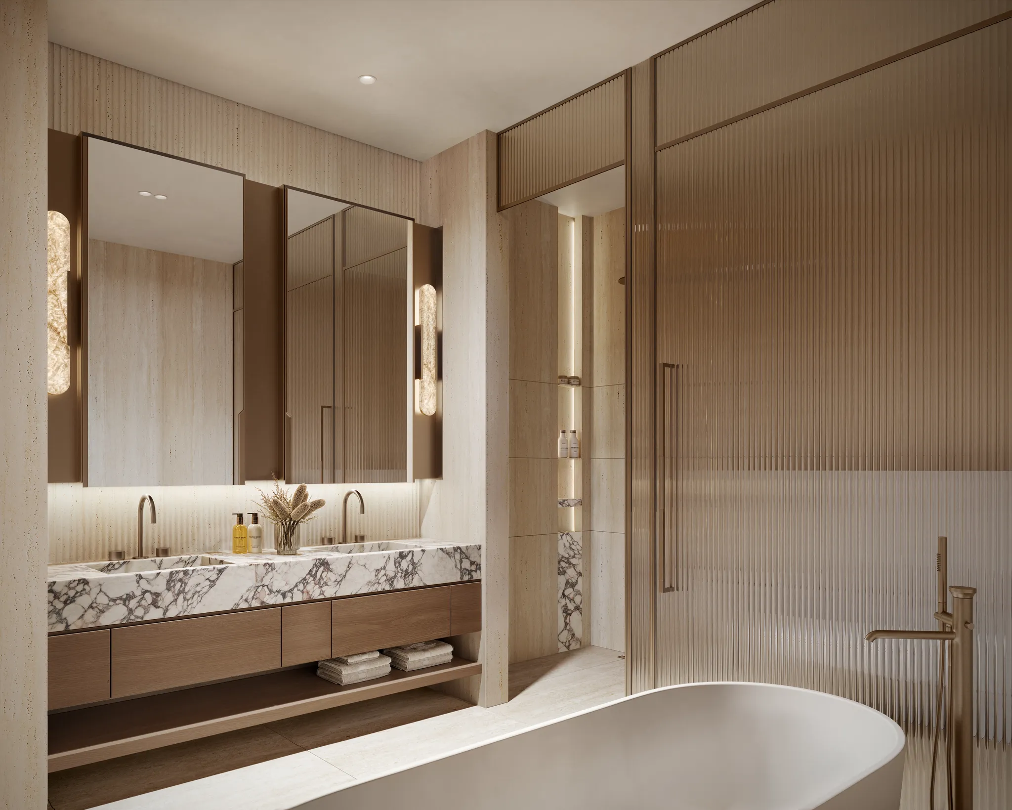 A penthouse master bathroom with a freestanding bath and twin marble basins